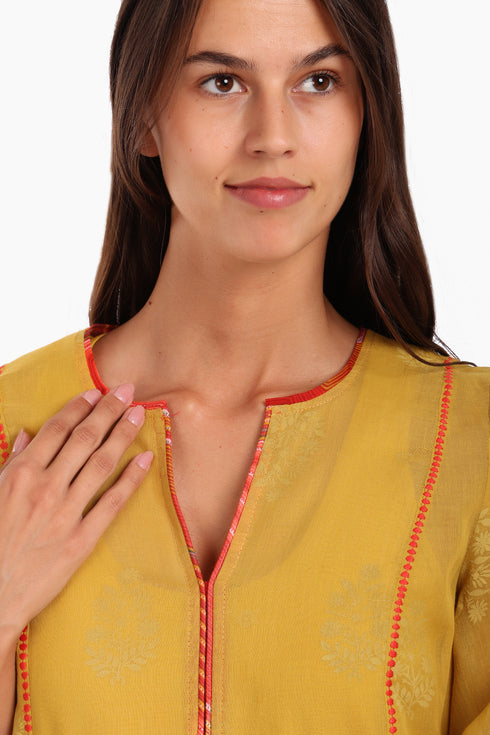 Embroidery tunic with contrast color piping in printed cotton voile